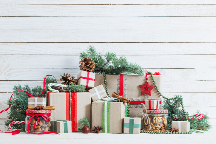 Christmas gifts on wooden background