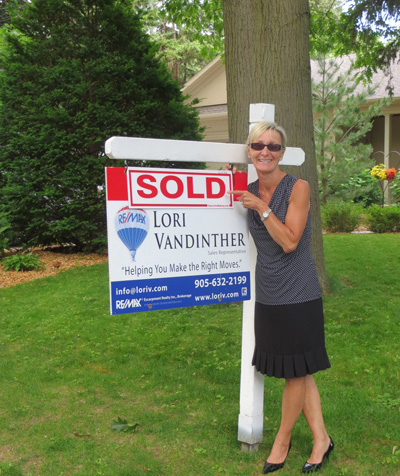 Lori VanDinther - SOLD sign